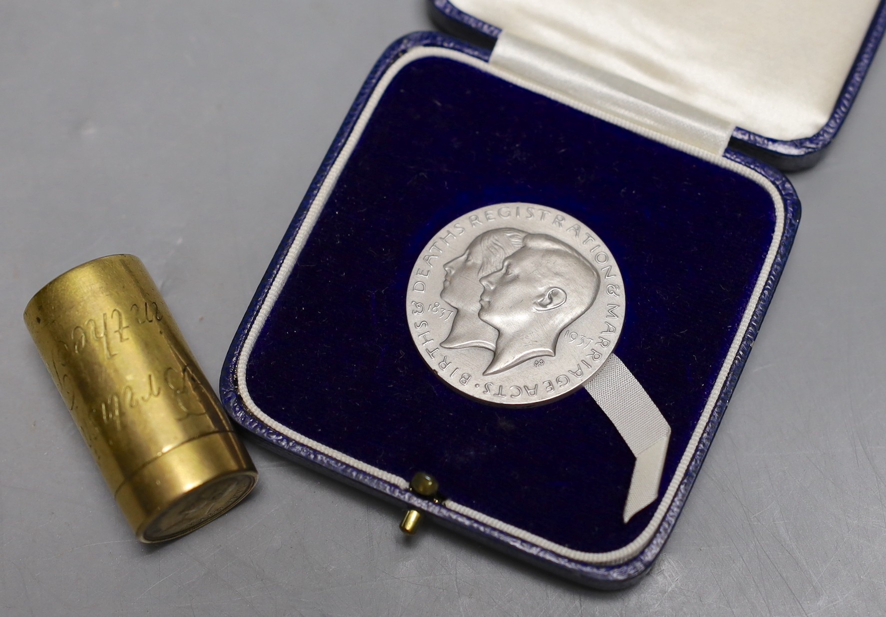 Marquis of Wellington’ British Victories in the Peninsular Campaign cylindrical brass box by Thomason & Jones, containing 23 gilt medallions, together with a cased silver commemorative medallion